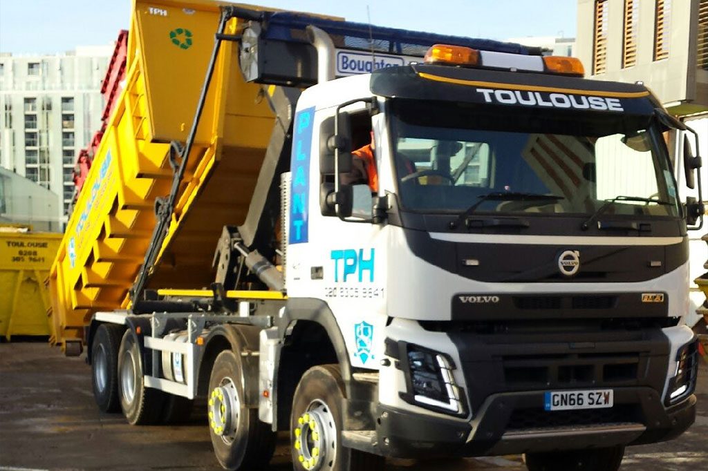 plant hire truck lowering skip