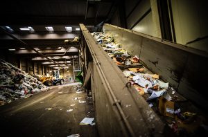 rubbish being sorted at recycling plant